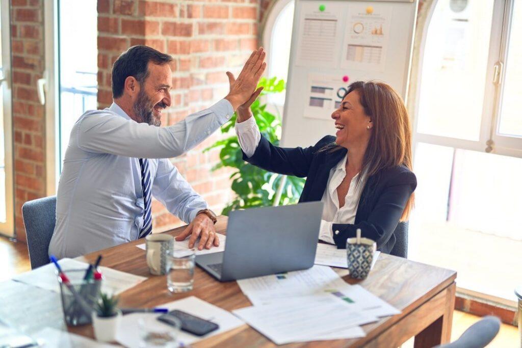 office workers celebrating success