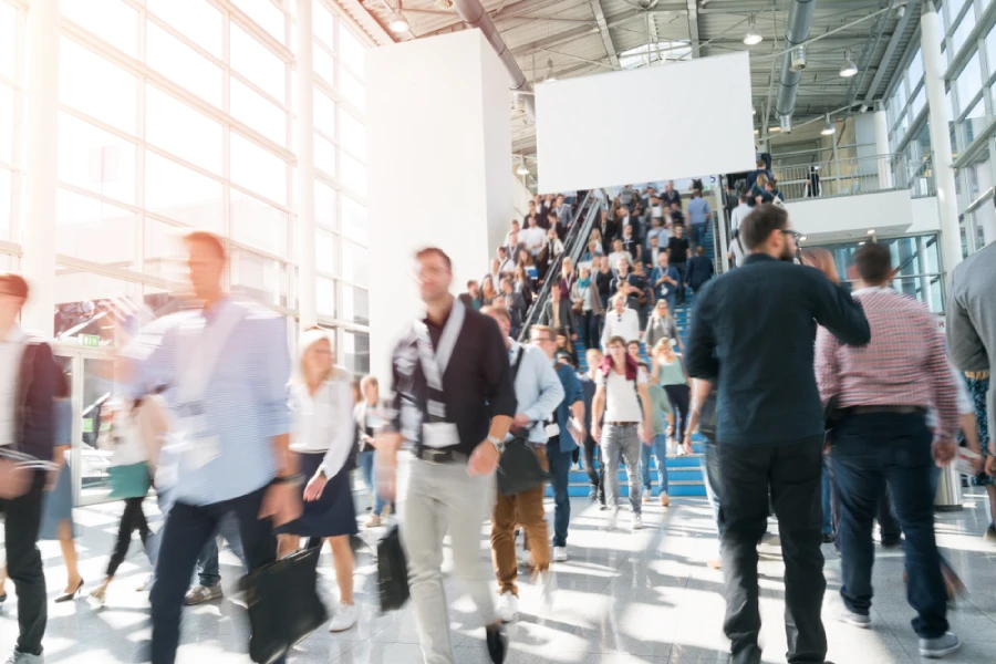 Blurred motion image of a trade show crowd at a convention center