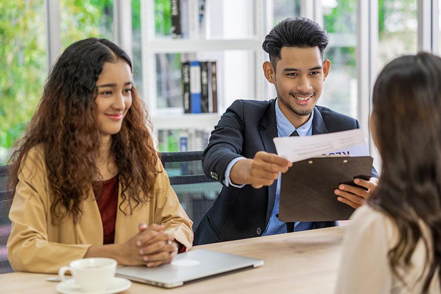 A hiring committee discusses company culture during an initial interview